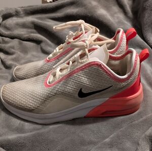 Nike White and Pink Athletic Shoes with Streamlined Design